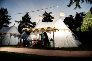 Parents outside tent_2