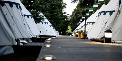 Glamping tents in a line
