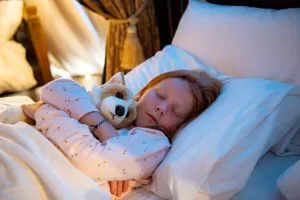 Girl sleeping in tent