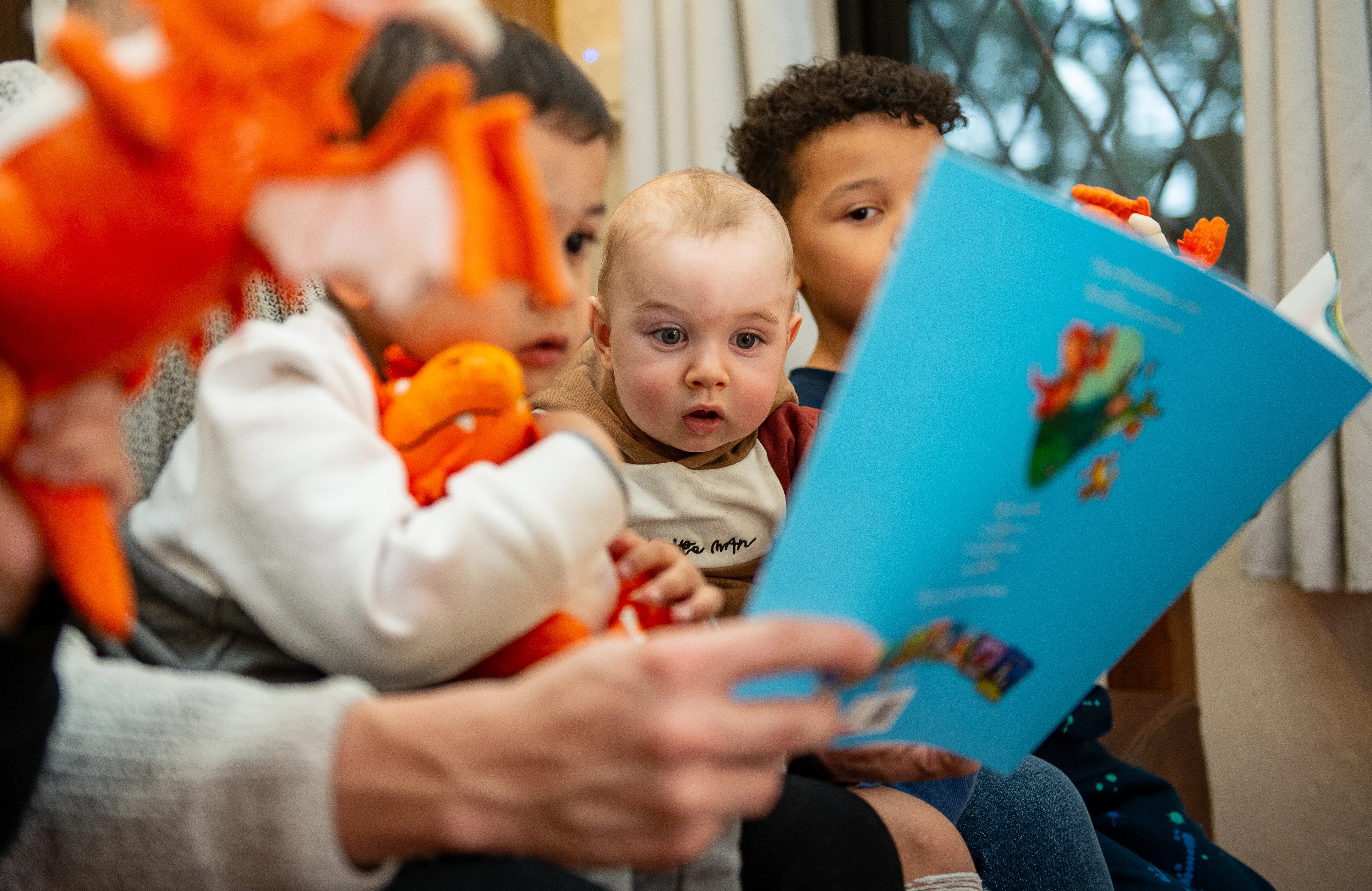 Children listening to Zog book