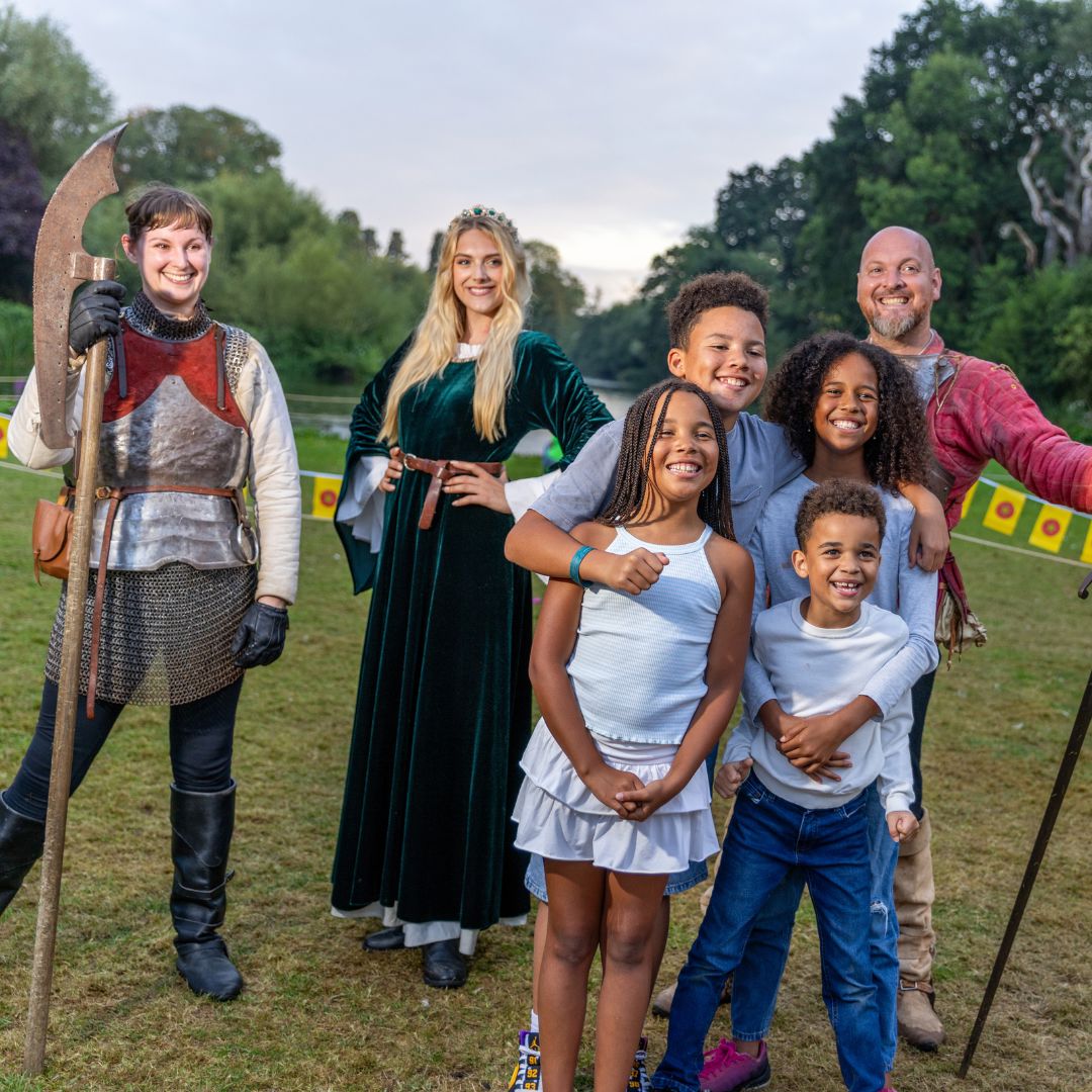 Warwick Castle family with real-life Knights during evening entertainment in the Knight's Village
